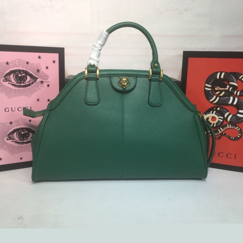 G*u*i top handle bags